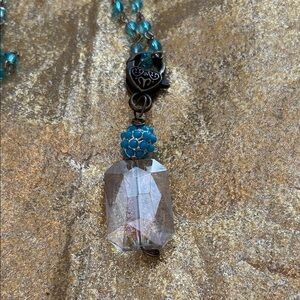 Elegant Crystal Pendant Necklace with Blue Accents on Blue Crystal Chain